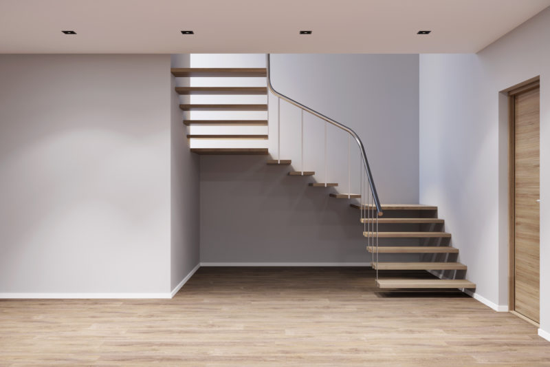 3d illustration. An empty entrance hall with stairs, doors, mock-up wall